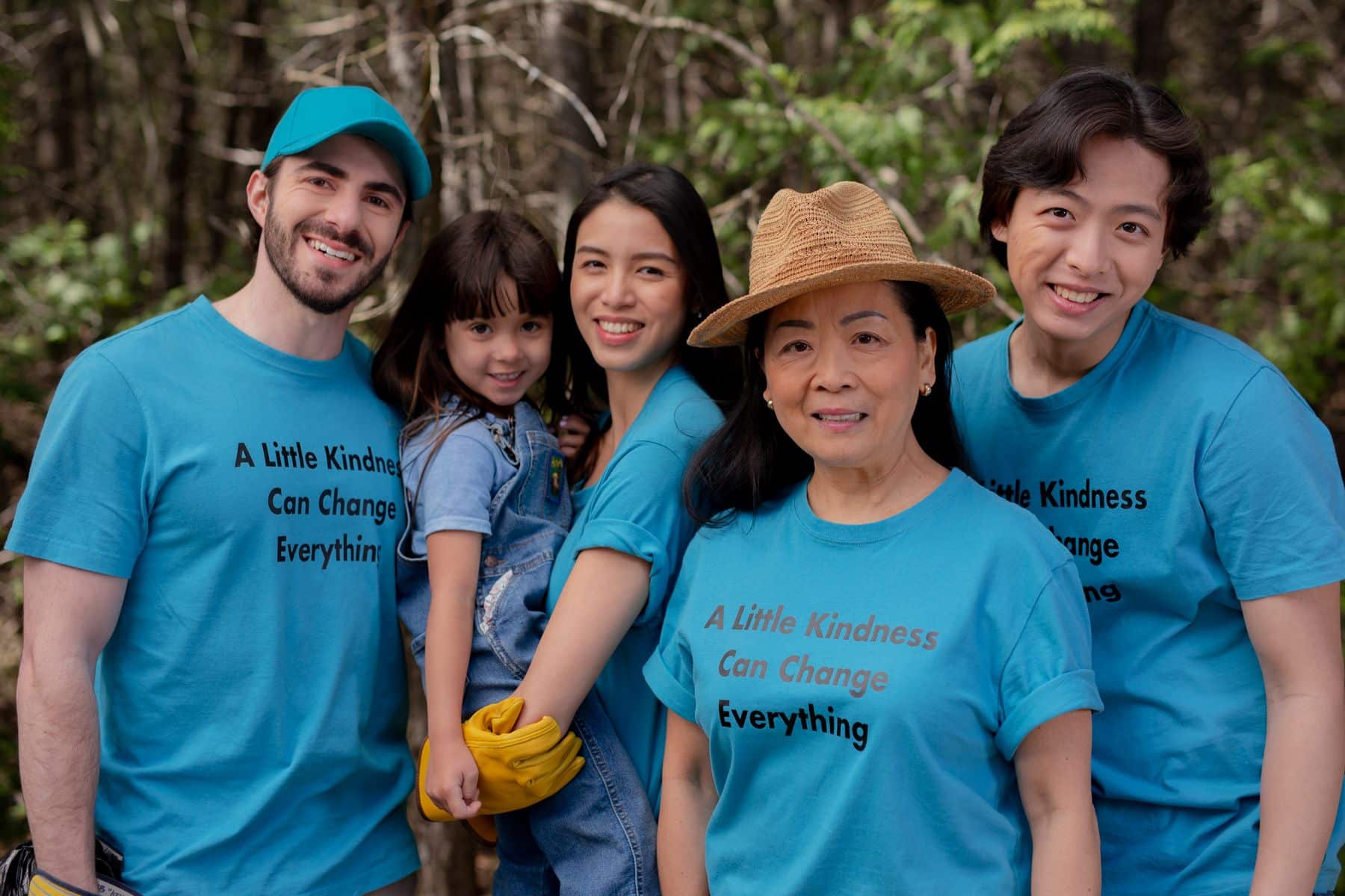 a family wears matching shirts about kindness