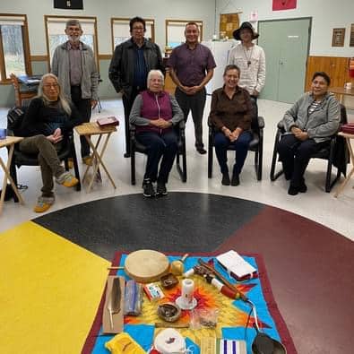 a group of people taking lateral violence training at Sandy-Saulteaux Spiritual Centre pose together