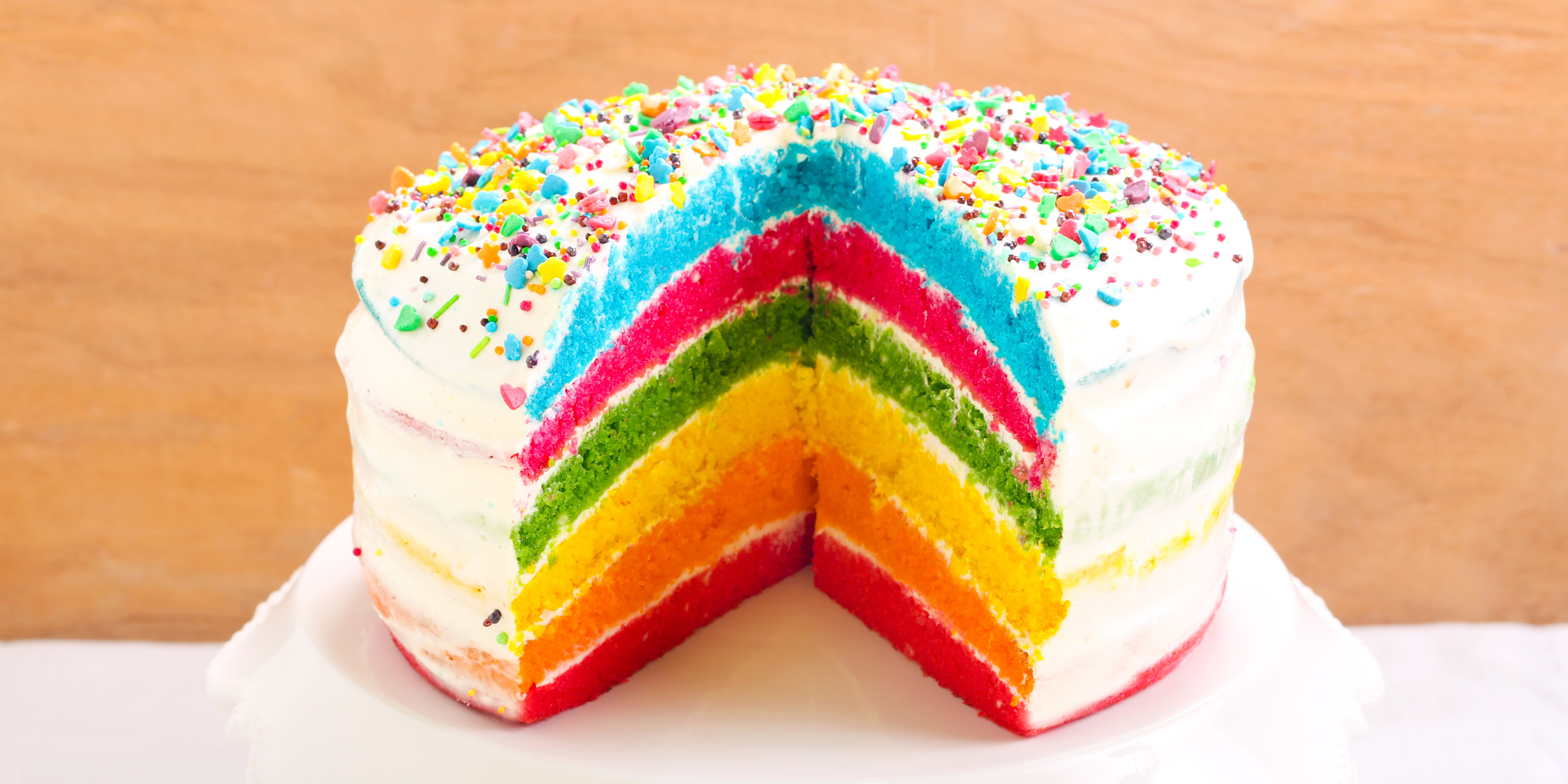 Rainbow cake sliced open. "Eventually, many communities of faith may ask “We are affirming now what?”"