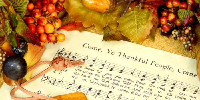 United Church Thanksgiving Hymn - Come Ye Thankful People Come sheet music with Fall decorations laid around